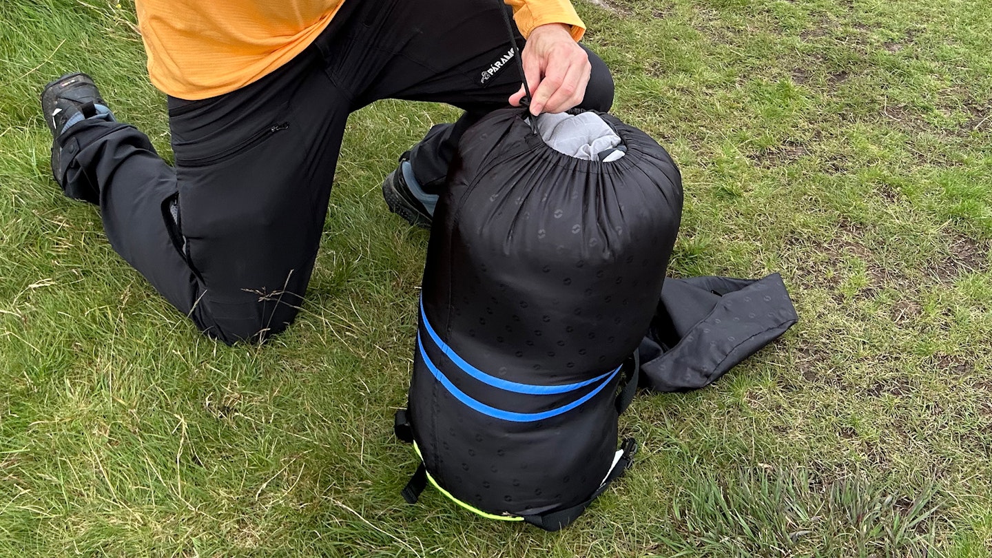 Stuffing the Outwell Campion double sleeping bag into its compact sack