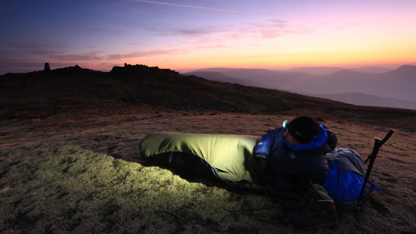In a bivvy bag, looking to the summit of Red Screes, Lake District