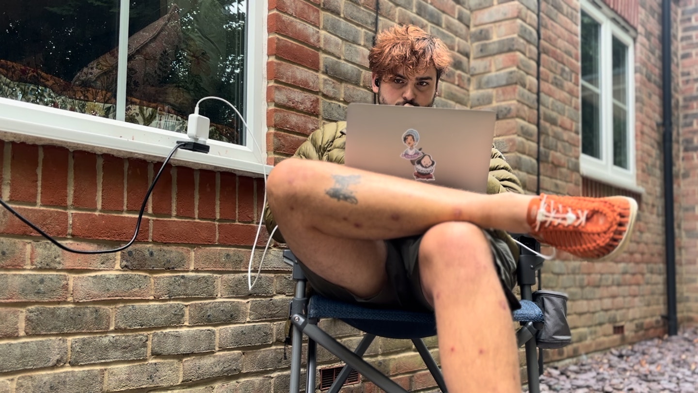 Milo Wilson sitting in the yeti trailhead camp chair writing this review