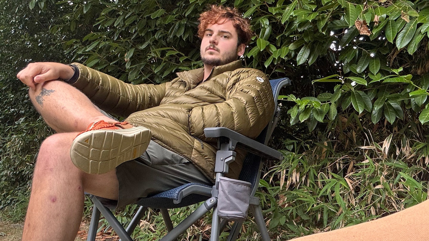 Milo Wilson sitting in the yeti trailhead camp chair
