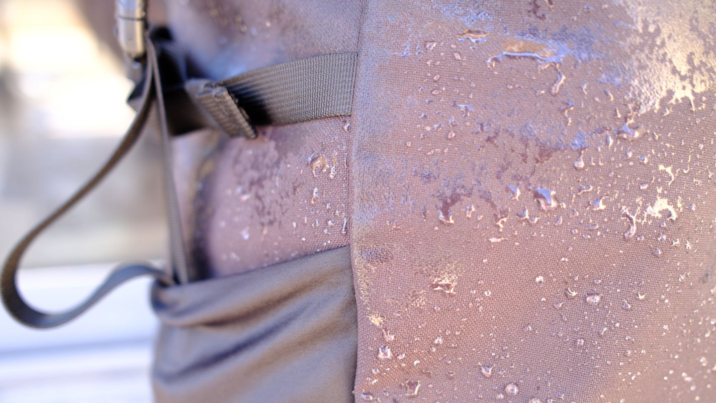 Fjallraven Ulvö Rolltop 30L backpack with water on it