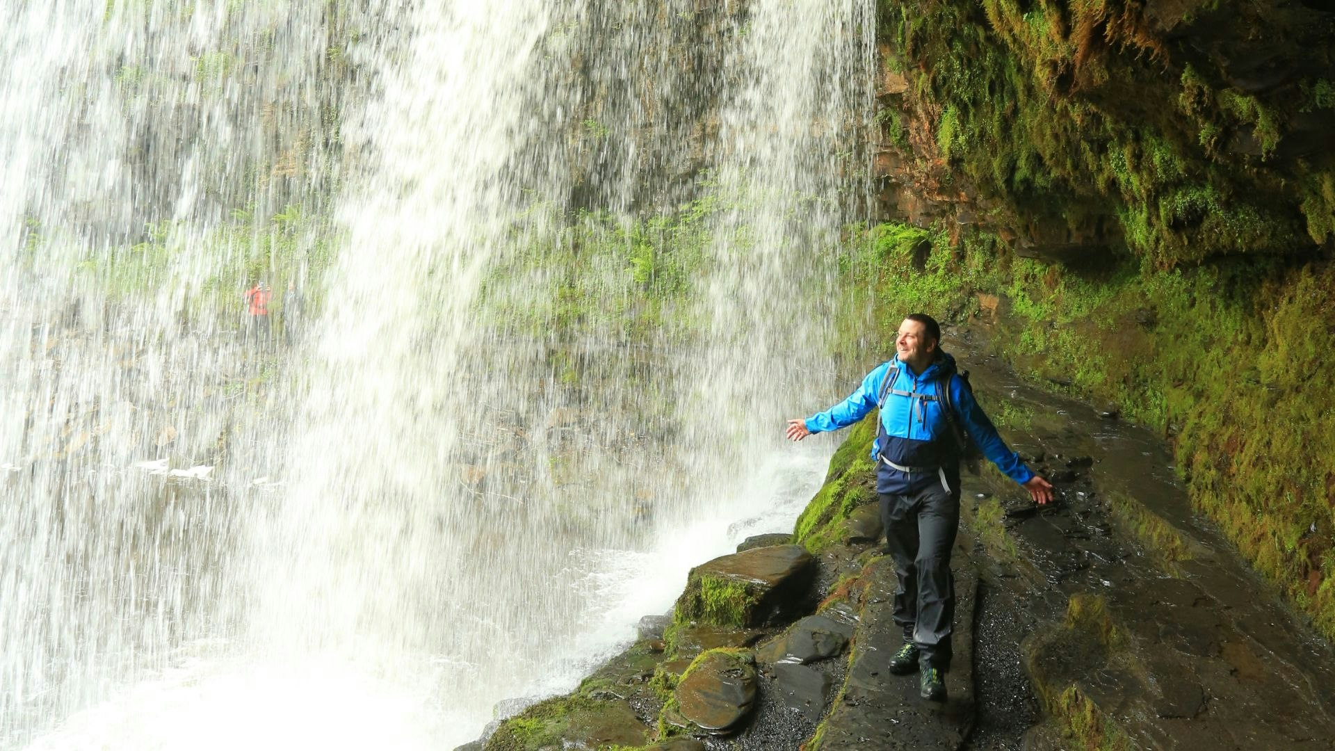 Nick Hallisey behind sgwd yr eira waterfall, Brecon Beacons