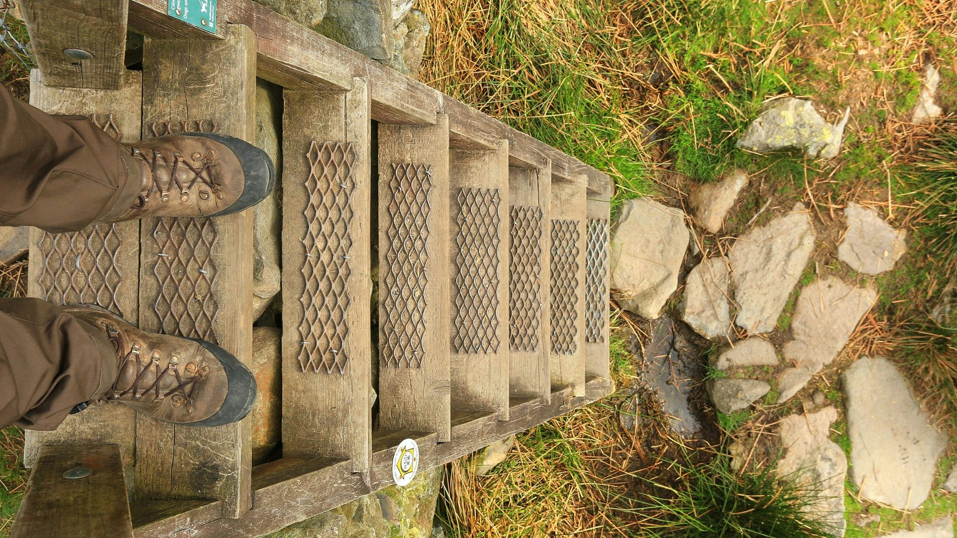 Walking boots on a stile