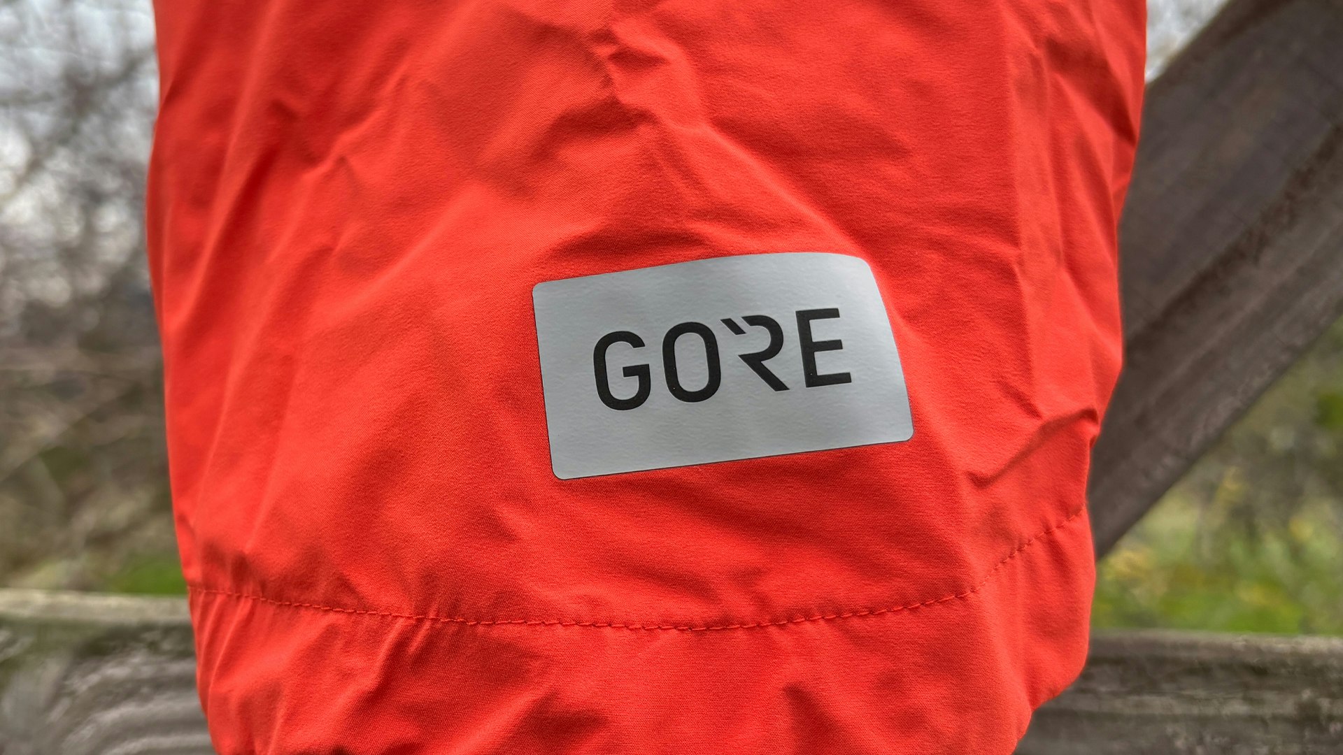 GOREWEAR logo on a fence