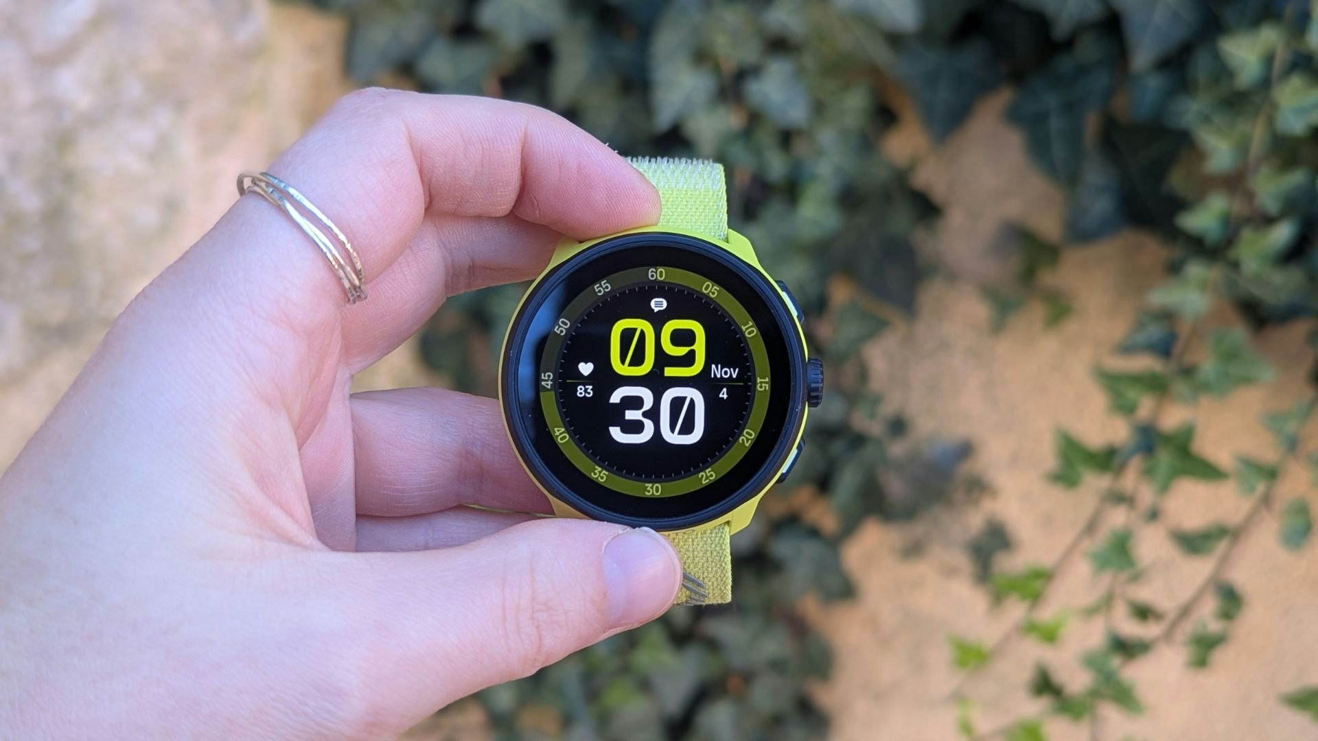 Suunto Run watch face being held by tester Kate Milsom
