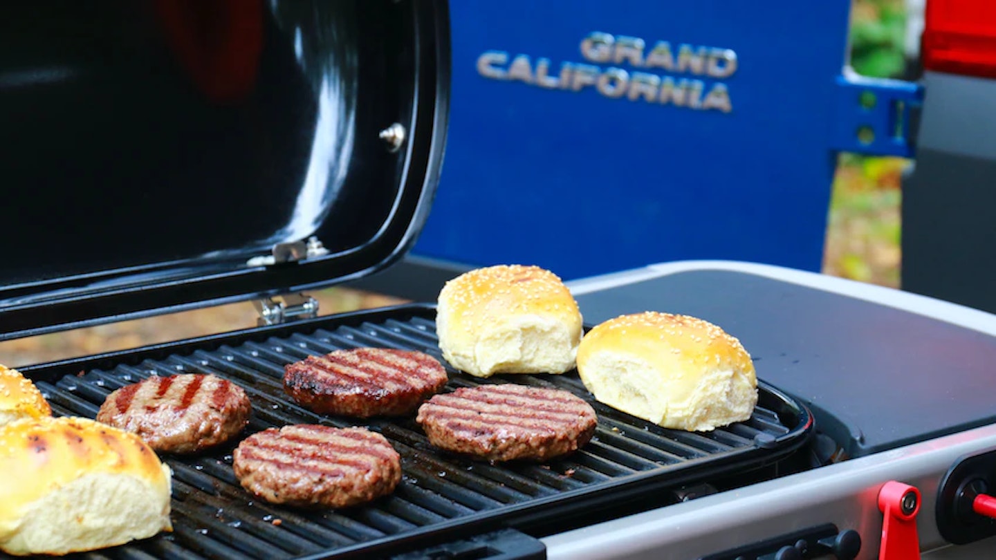 burgers cooking on Weber Traveler