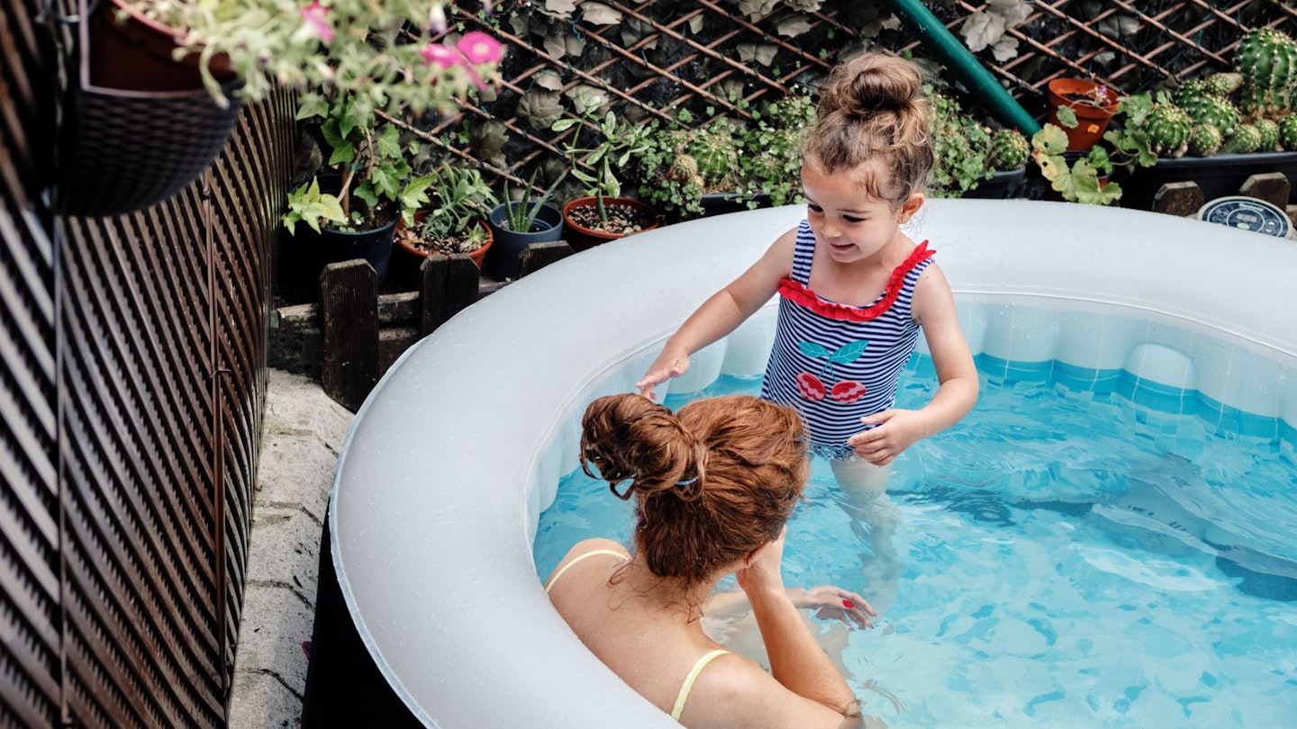 Woman and child in hot tub