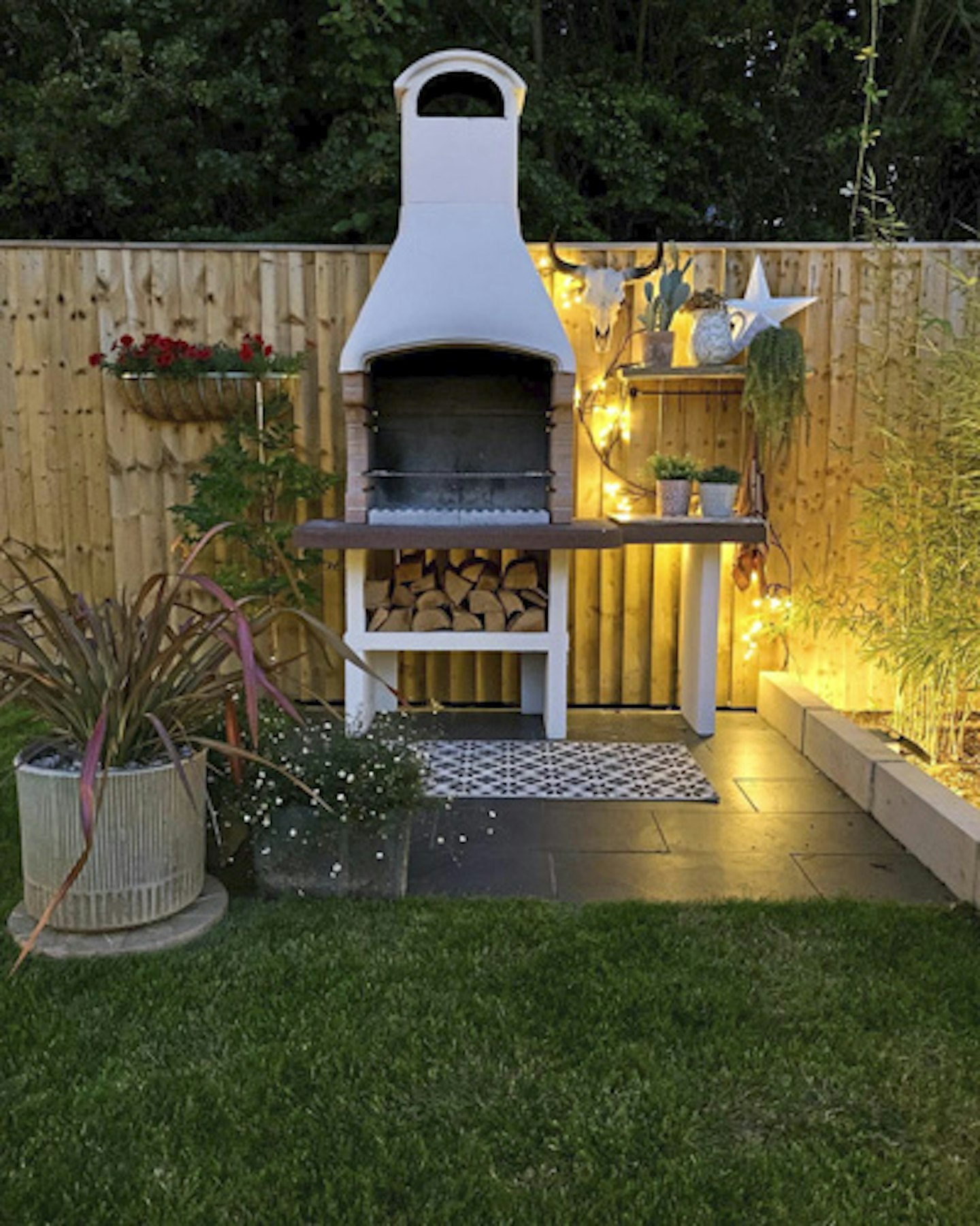 BBQ grill lit up at night