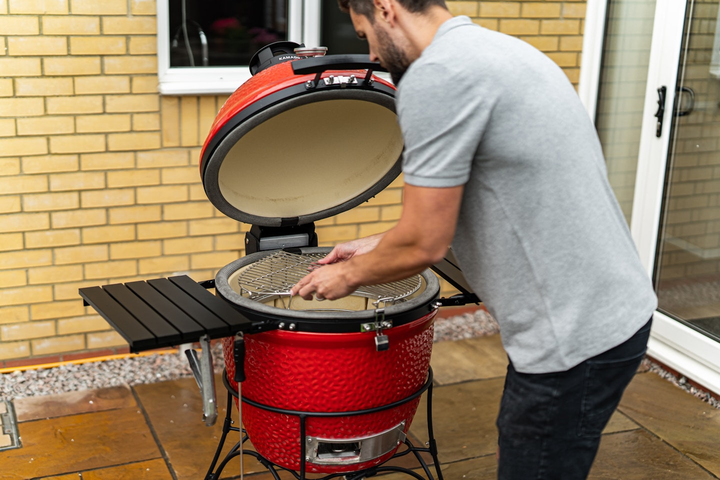 Amazon technician assembling the BBQ