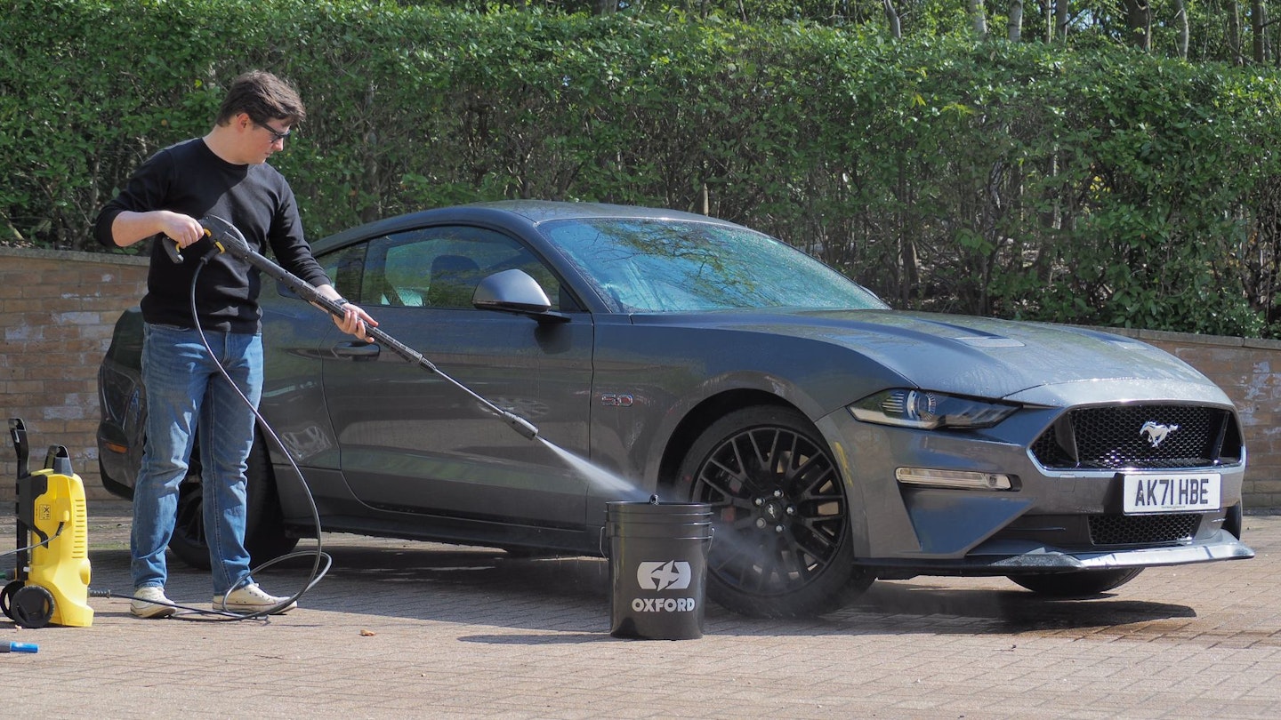 Pressure cleaning a Ford Mustang