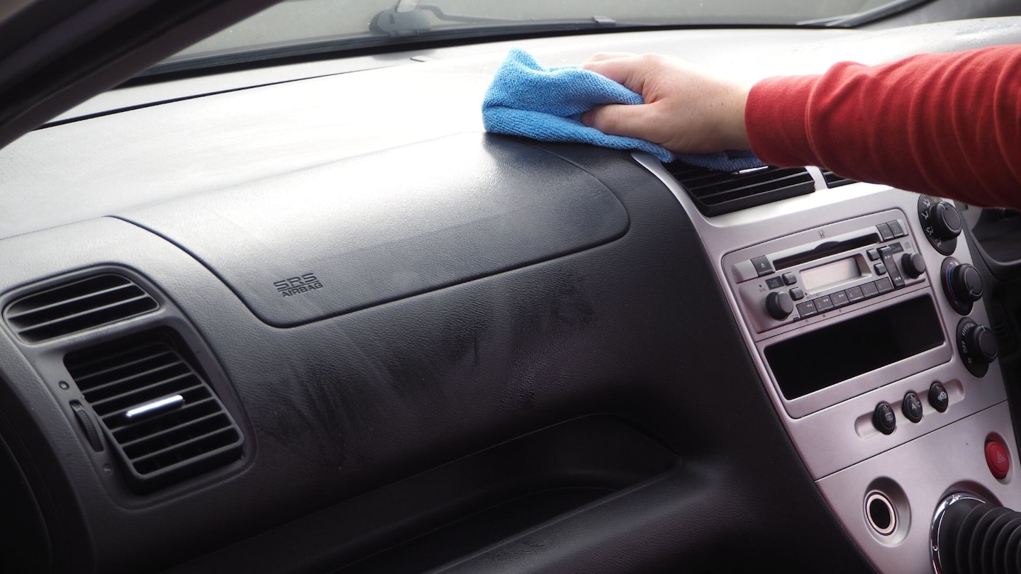 Cleaning car dashboard