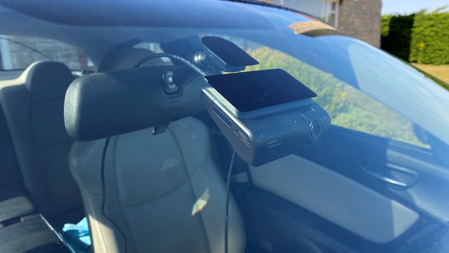 Thinkware Q1000 front camera mounted on windscreen