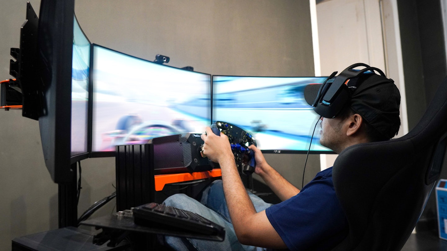 Man in a racing simulator