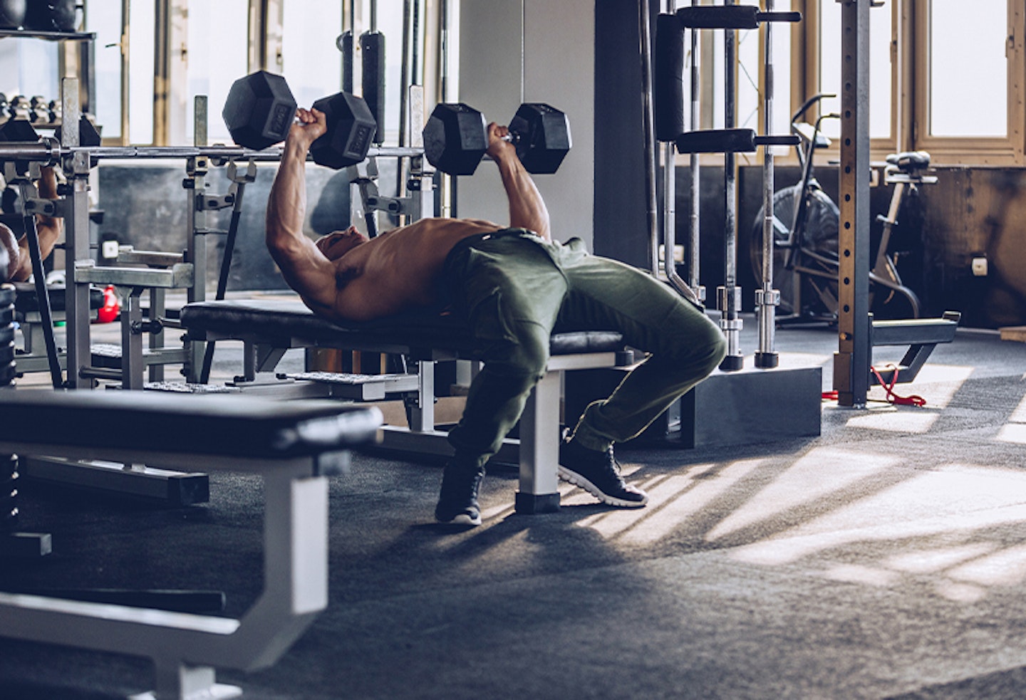 Man doing dumbbell bench press