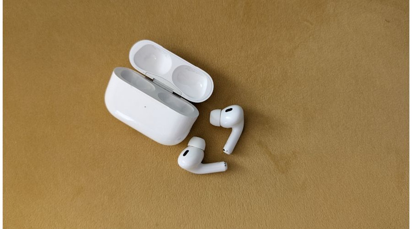 Apple AirPods Pro 2 on yellow background