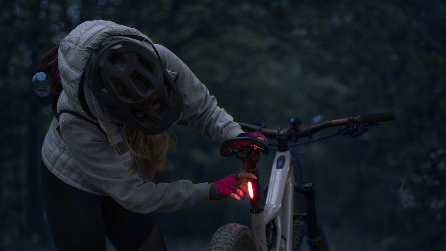 Mountain biker with a rear bike light