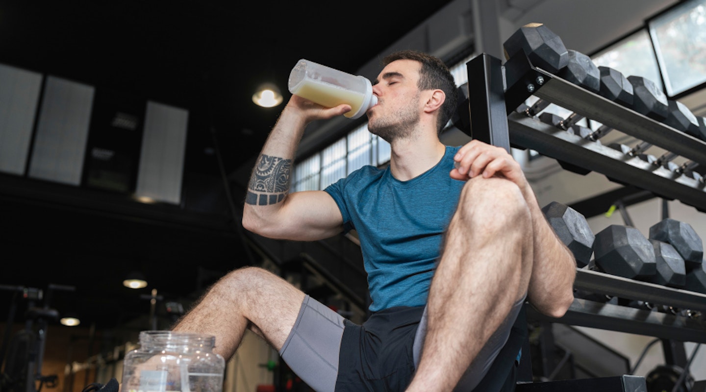Man drinking the best BCAAs in a drink