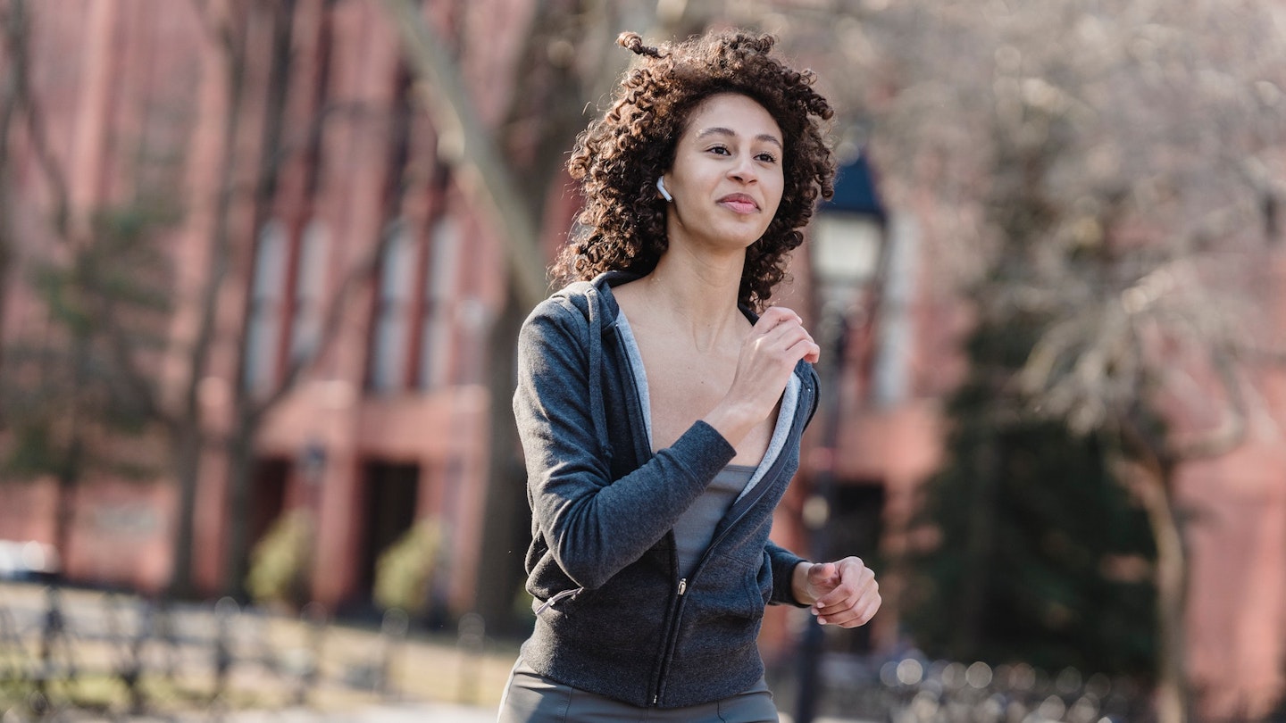 Woman running with earphones
