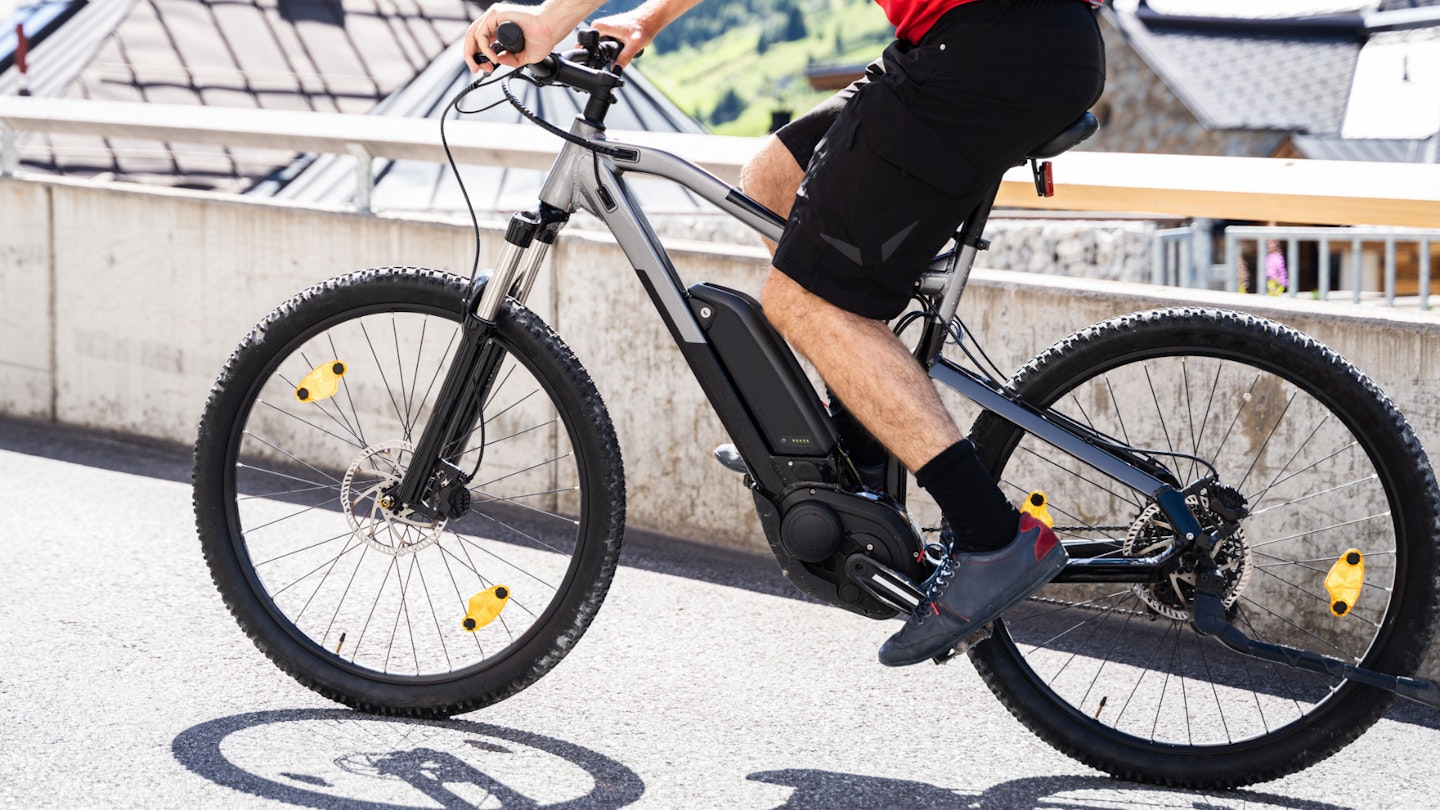 someone riding possibly the best electric bike under £2,000