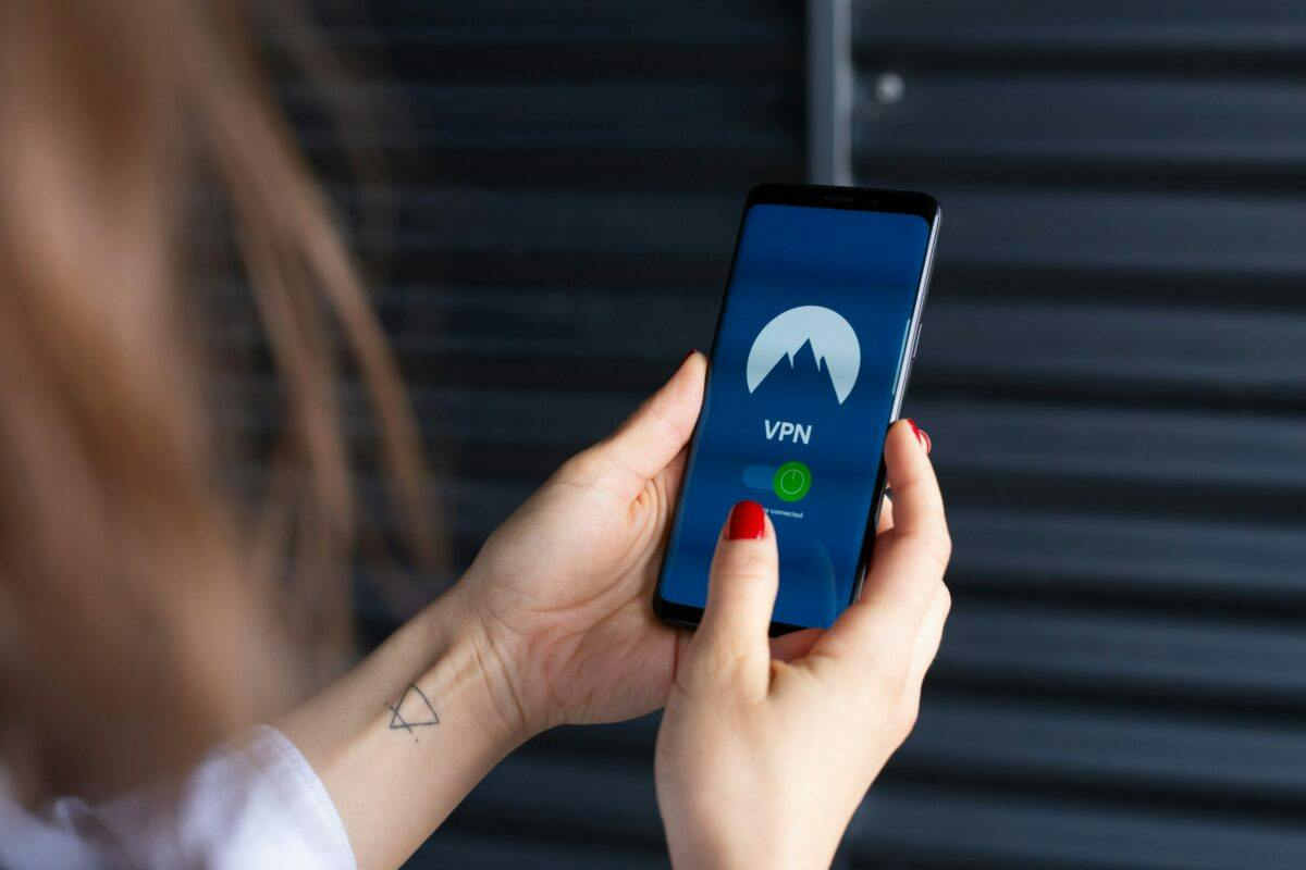 A person on a smartphone using a free VPN