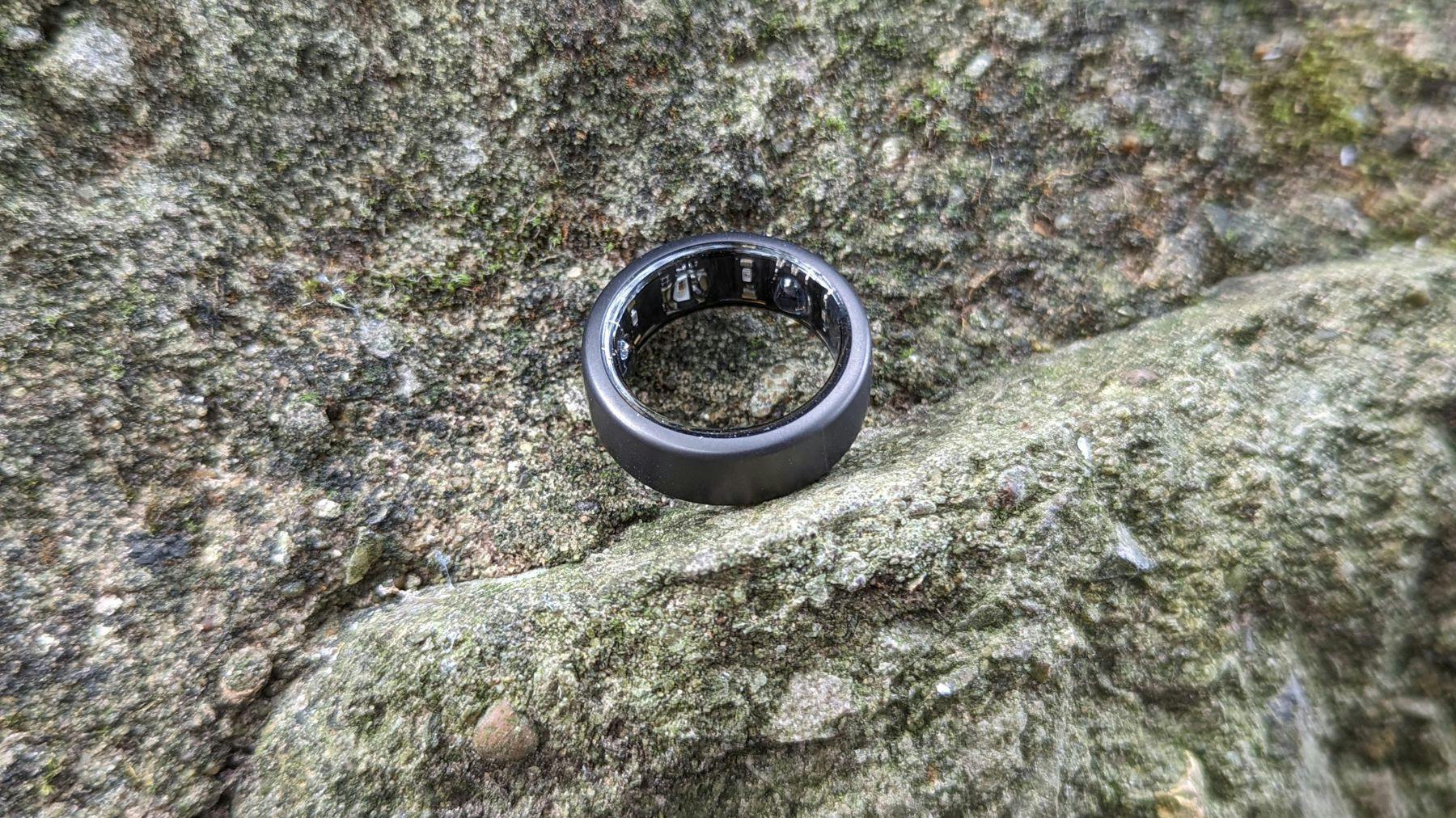 Best smart rings: Oura Ring on stone background