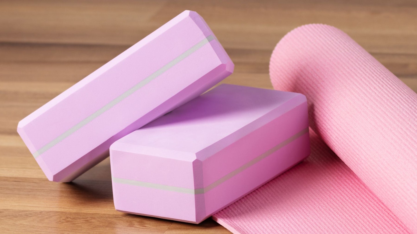 Two of the best yoga blocks resting on a yoga mat