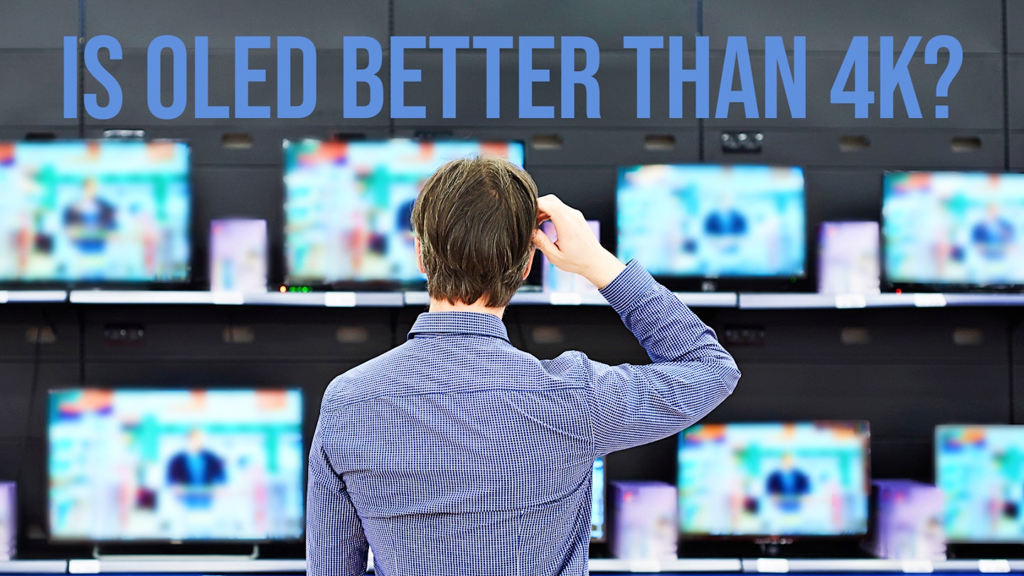 confused man looking at tvs asking is OLED better than 4K