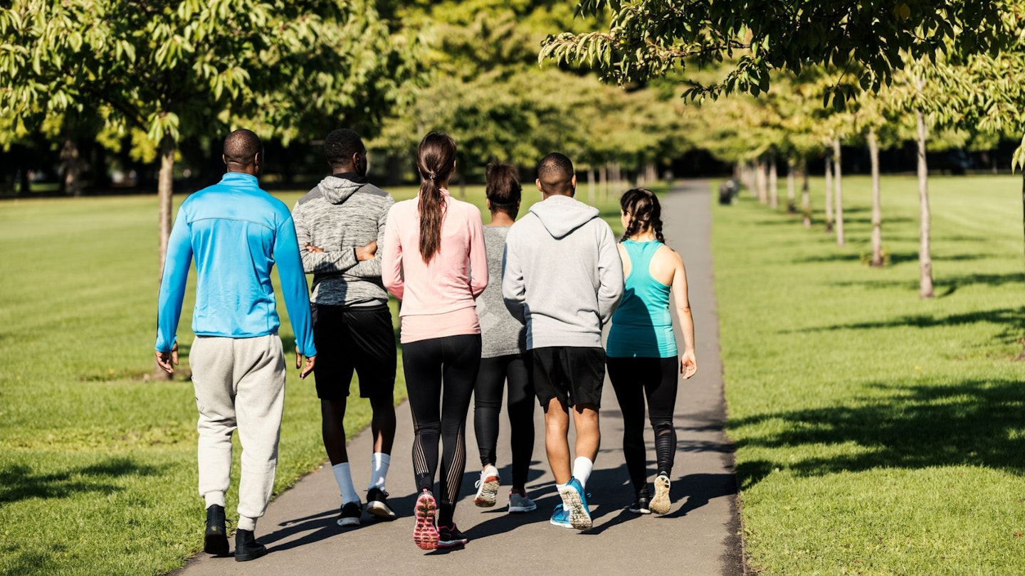 A group of individuals walking in the outdoors - is walking good for weight loss? Image credit: Getty Images