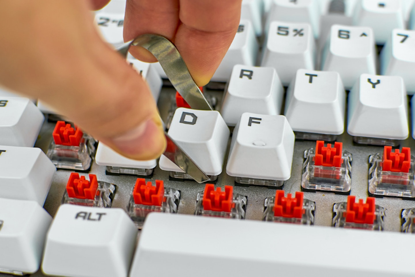 MECHANICAL KEYBOARD SWITCHES AND KEYCAPS BEING REMOVED