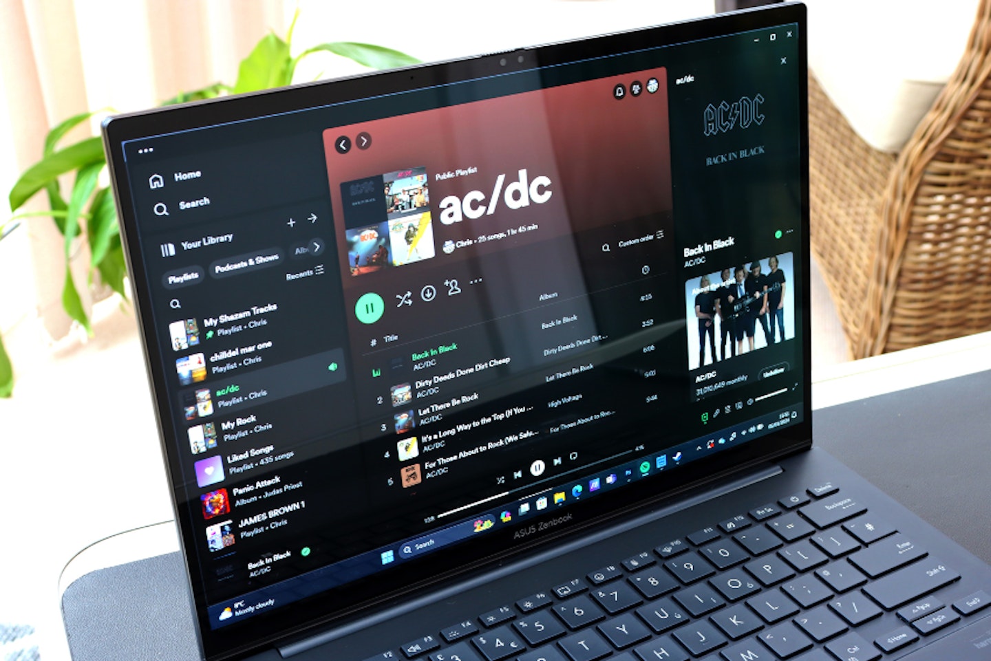 ASUS Zenbook 14 OLED laptop PLAYING SPOTIFY