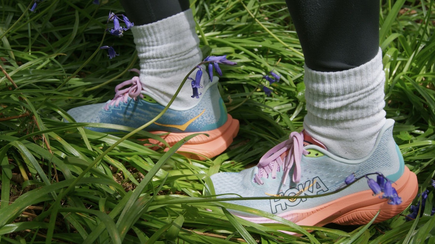 Hoka Mach 6 Trainers in a forest
