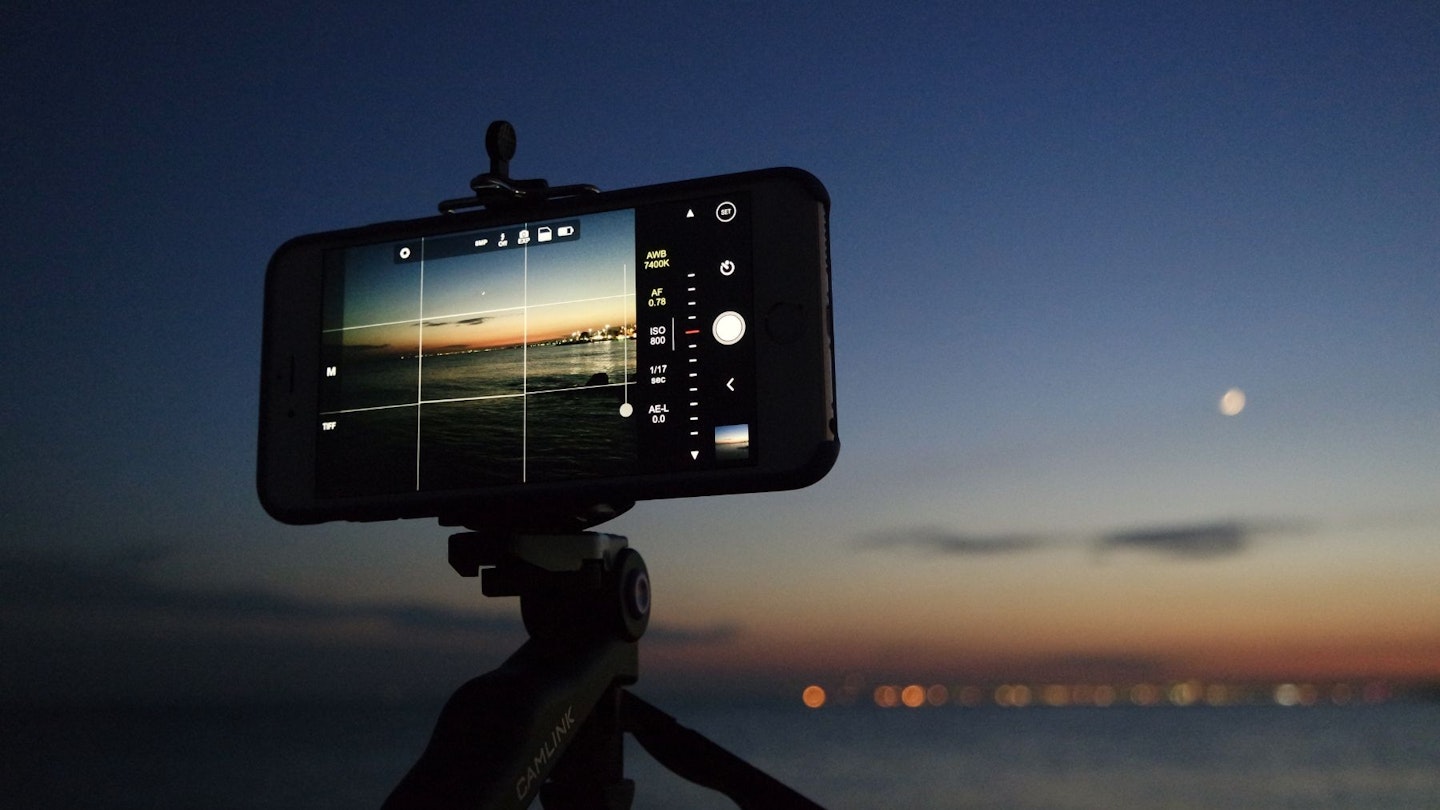 A smartphone on a tripod for night time photography