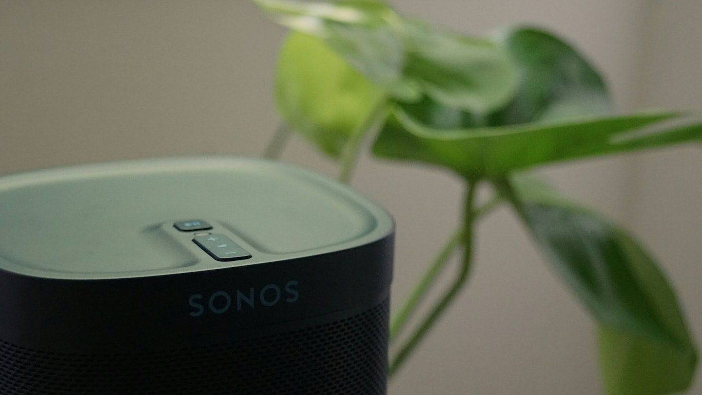 One of Sonos' top wireless speakers placed next to a plant