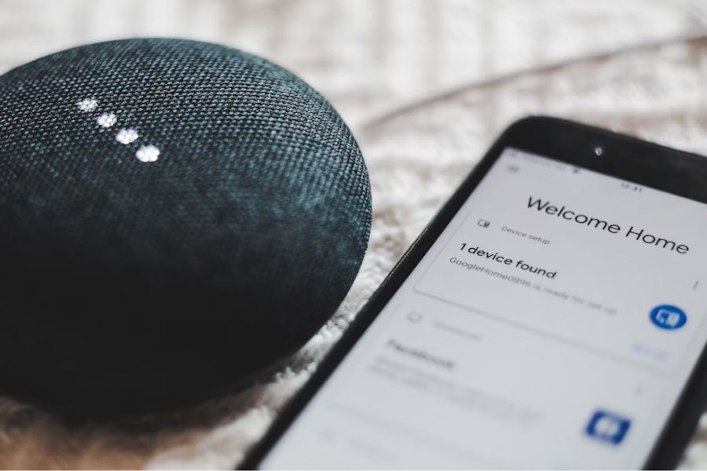 Unsplash wireless Google Nest Mini connecting with companion app for multiroom audio