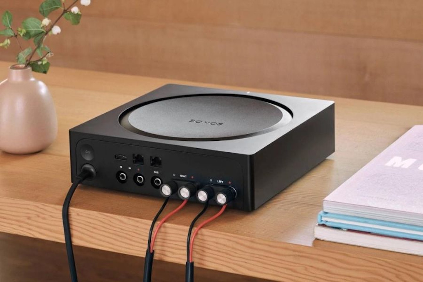 Sonos Amp on a sideboard table in a home living space