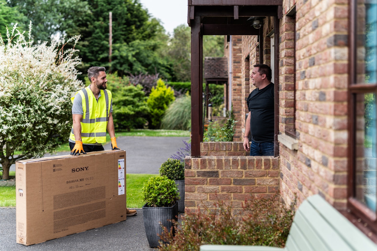 Man delivering TV