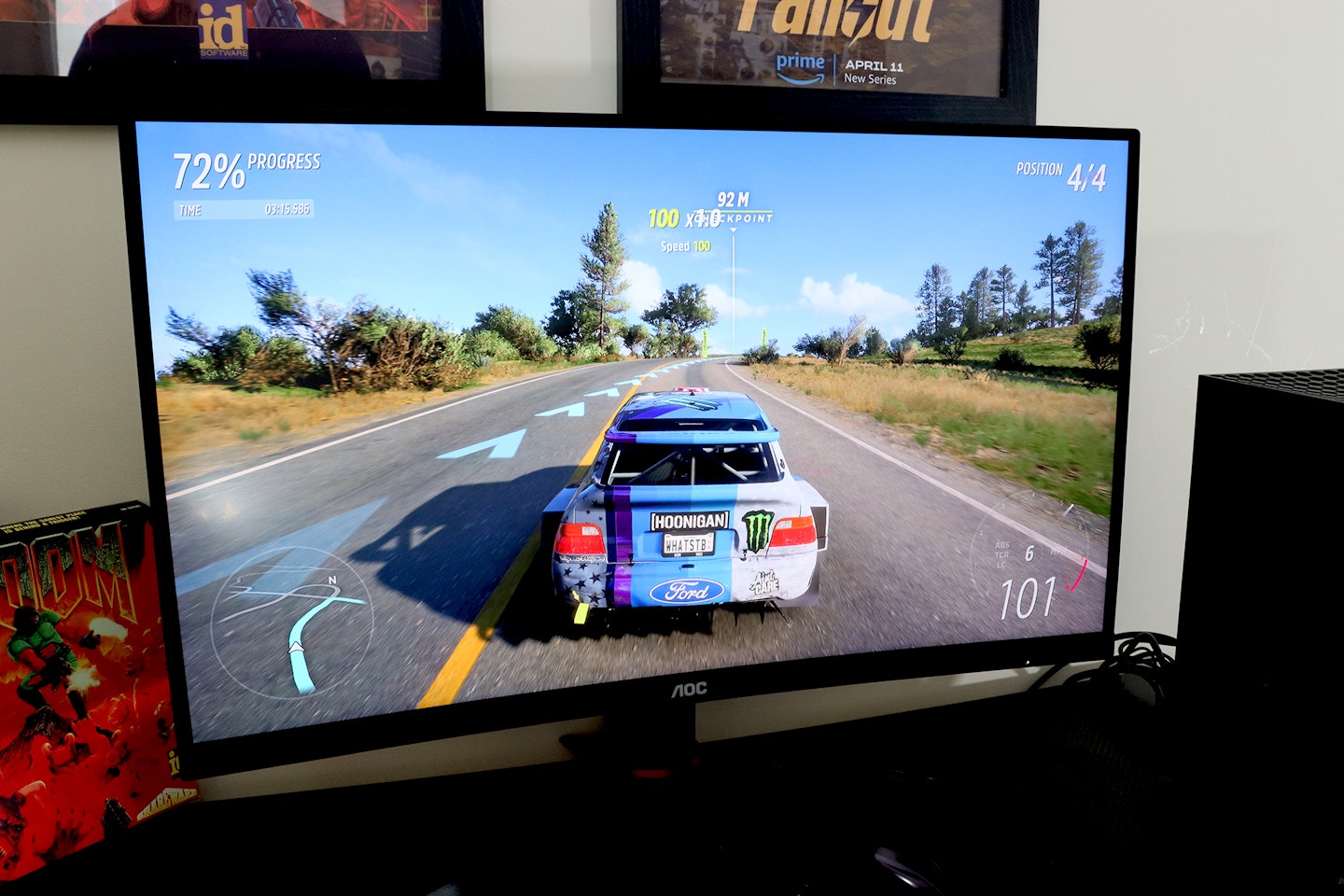 AOC Gaming CQ27G2SE monitor on a desk with an Xbox and Forza Horizon 5