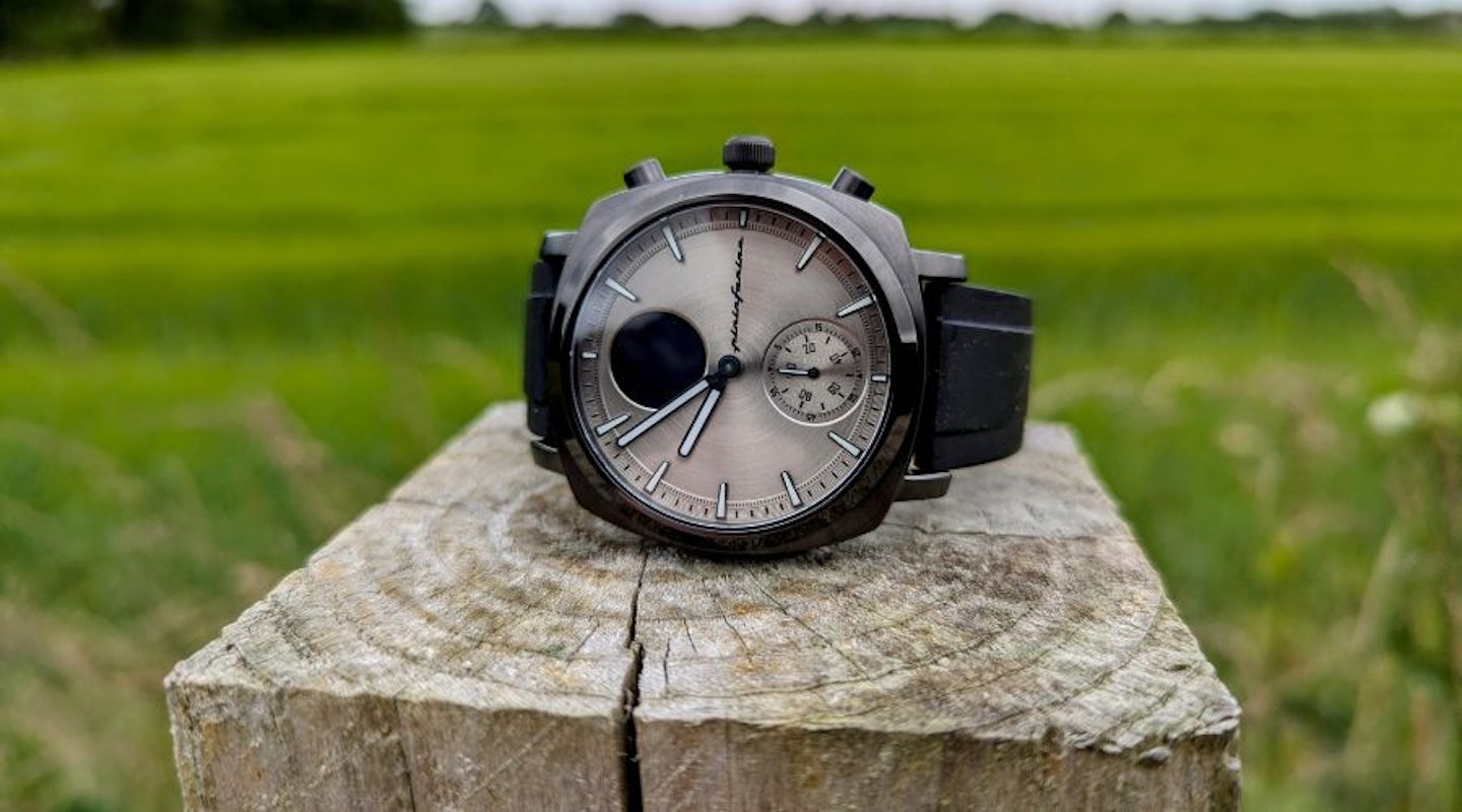 Pininfarins Senso Sport hybrid smartwatch on a fence post