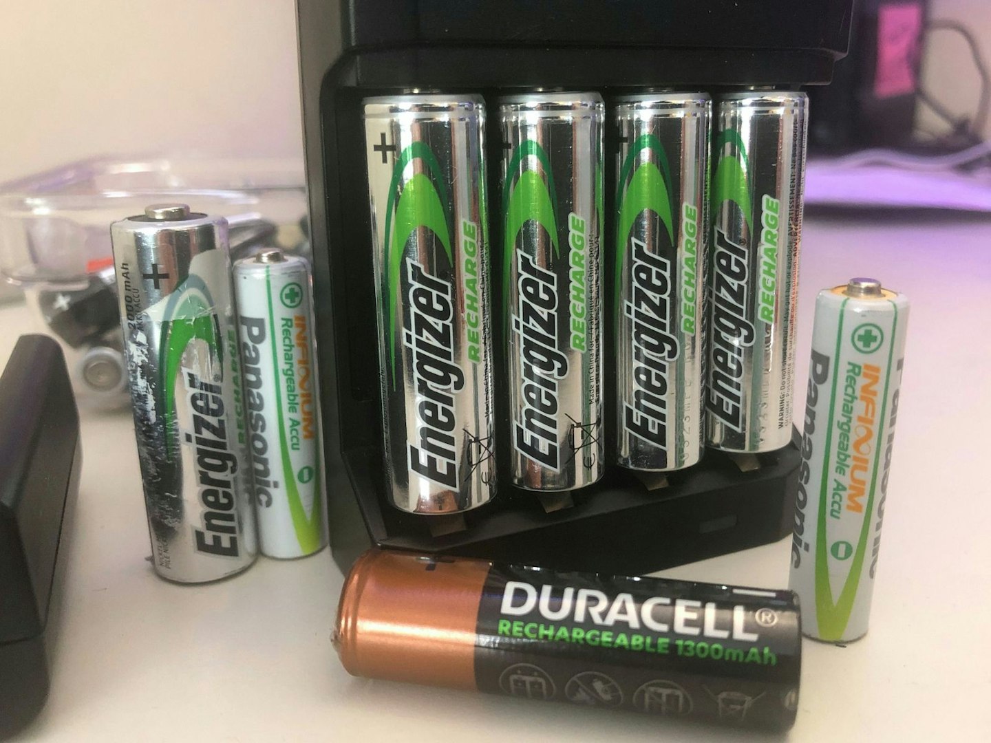 some rechargeable batteries on a desk