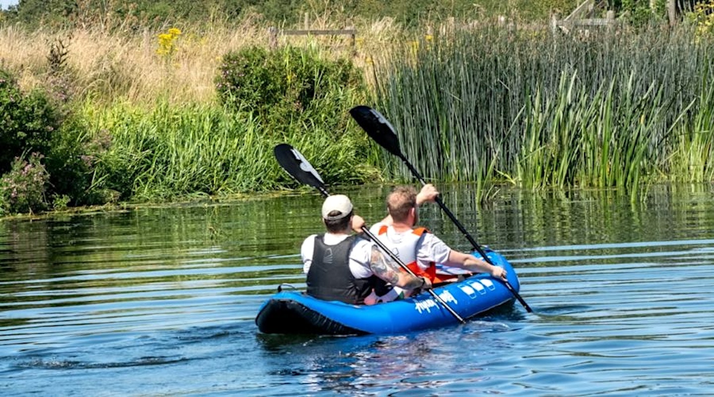 William Austin-Lobley and Adam Binnie in kayak with buoyancy aids