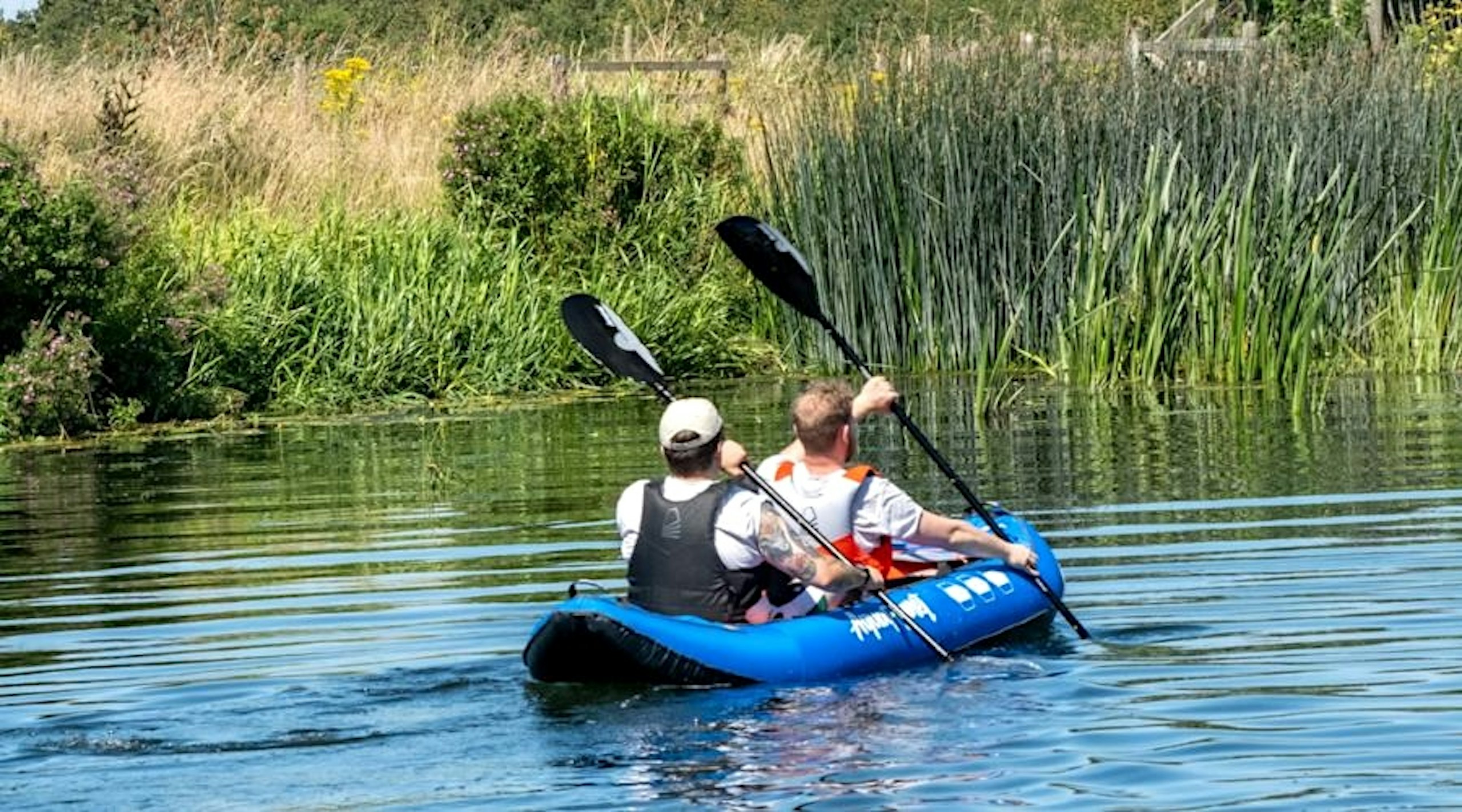 William Austin-Lobley and Adam Binnie in kayak with buoyancy aids