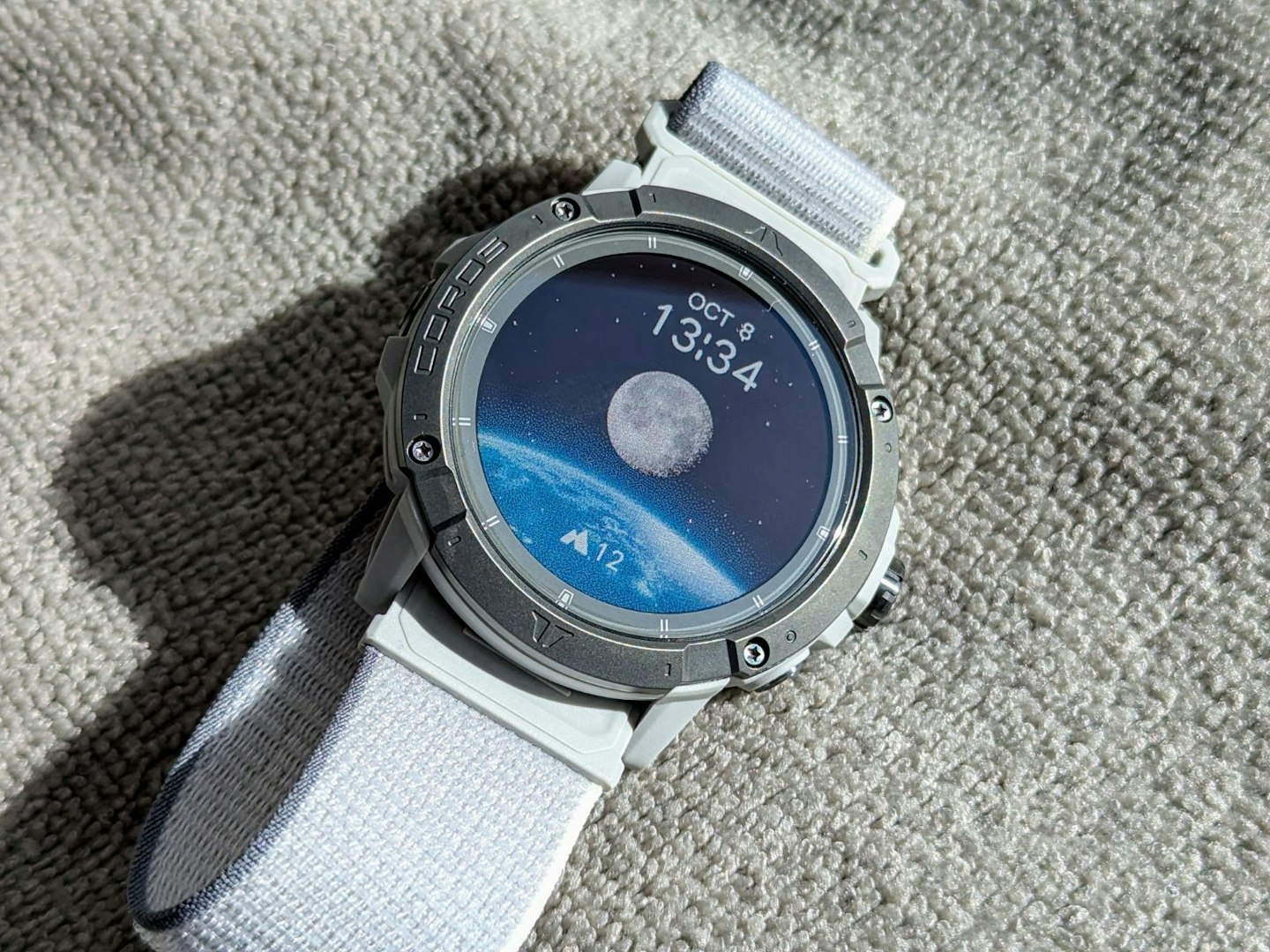 Coros Vertix 2S watch with moon watch face