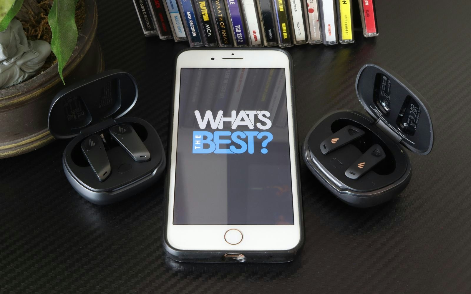 Edifier NeoBuds Planar earbuds and NeoBuds Pro 2 cases next to iphone with WTB logo
