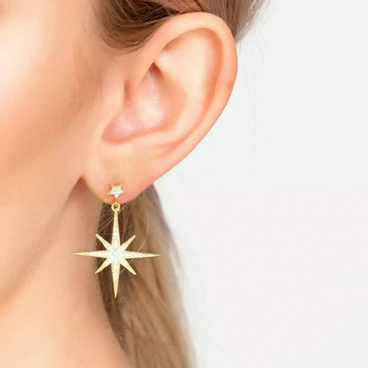 Gold star earrings