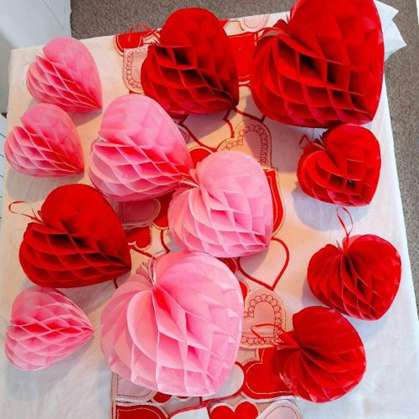 Aerial view of Premium Reusable Valentines Decorations laid out on a table-top