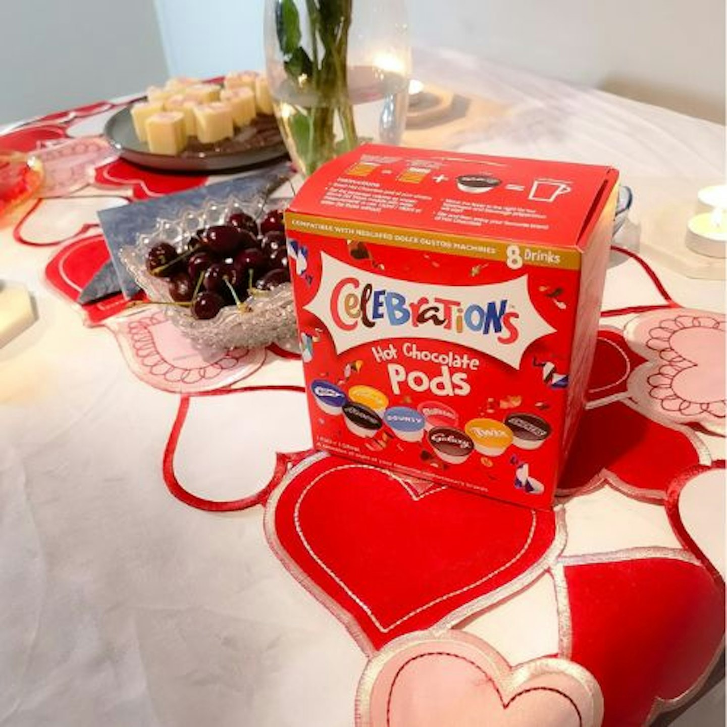 Valentine's Day table with hot chocolate pods, cherries, cake and roses on the Simhomsen Embroidered Love Heart Table Runner