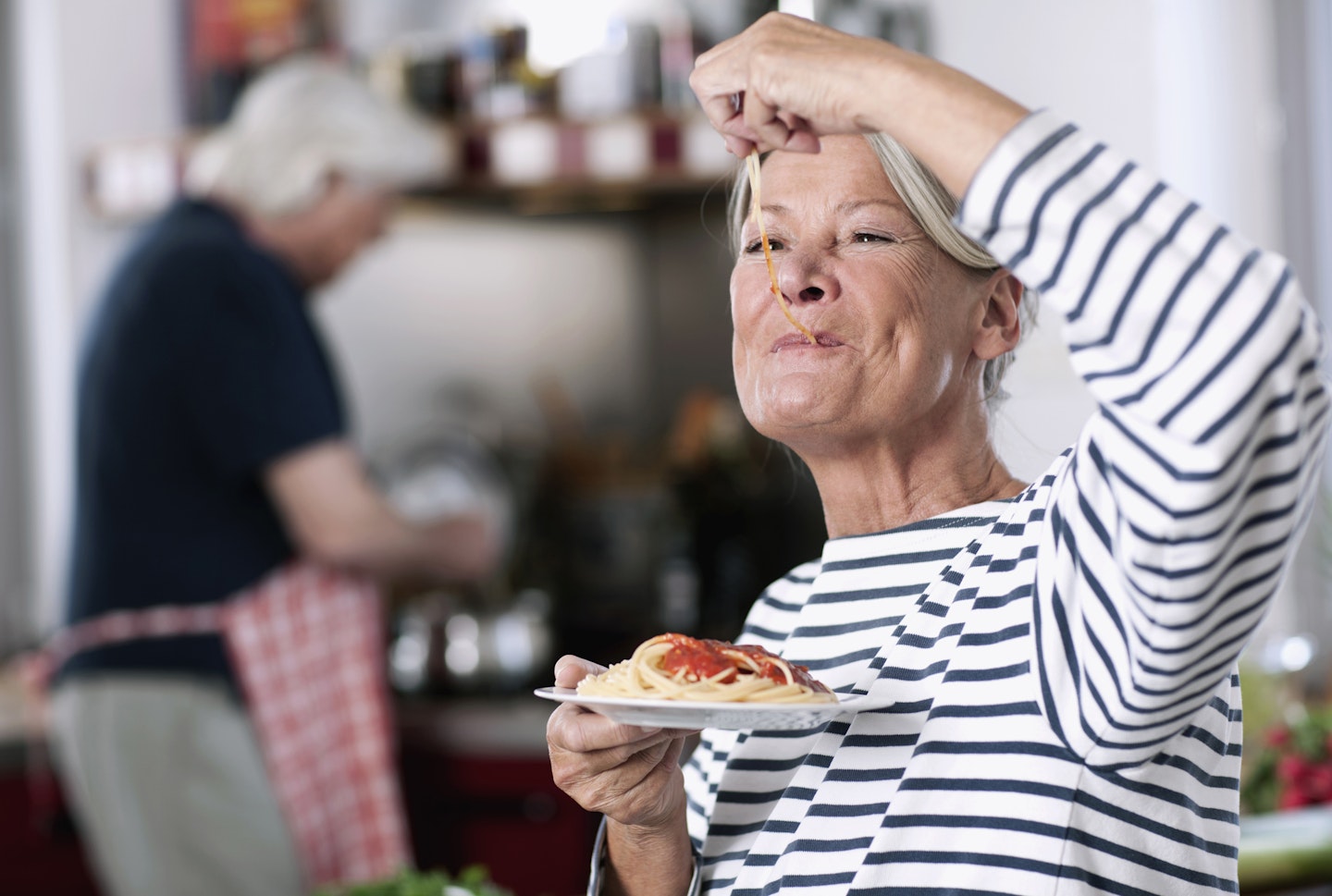 woman eating spaghetti