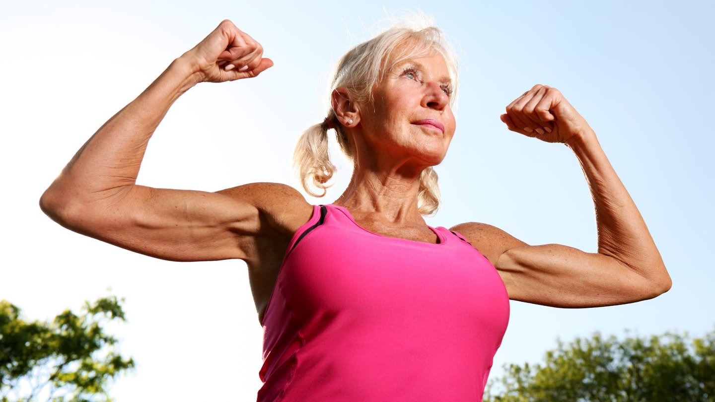 Woman flexing her biceps