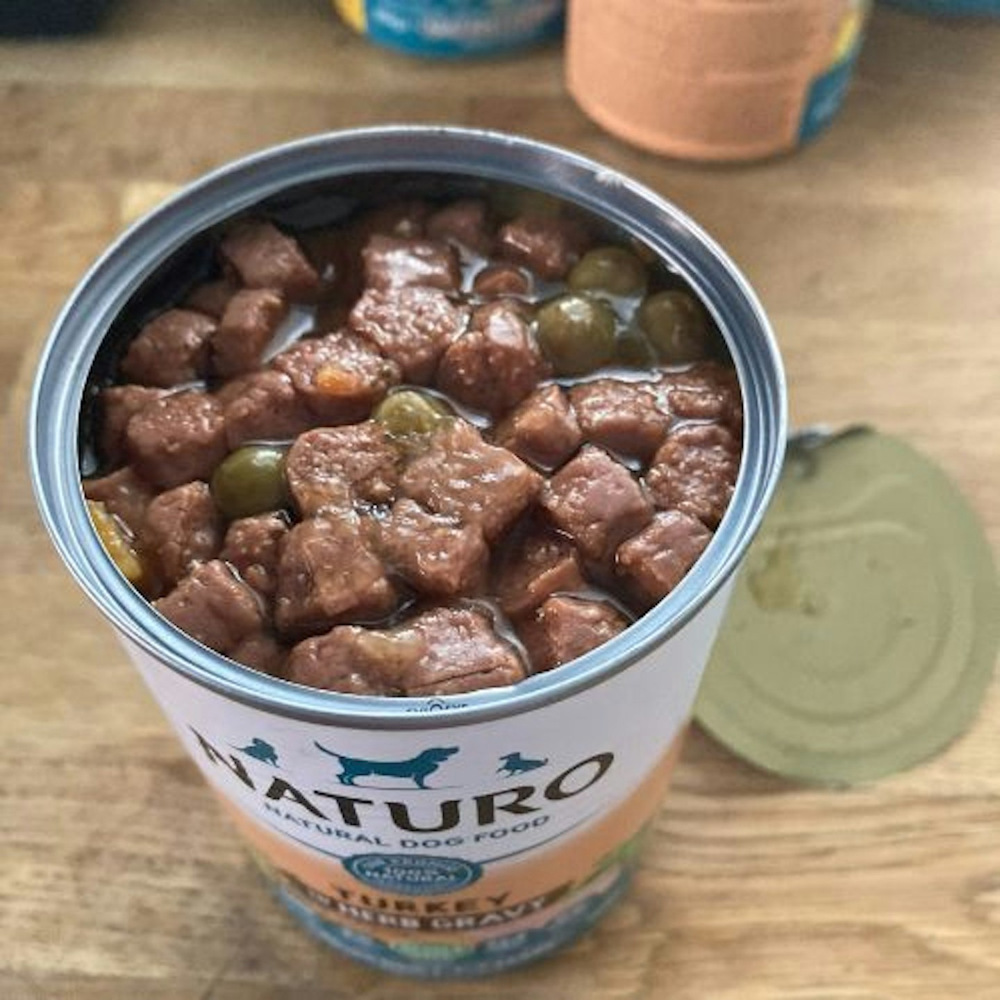 An open can of Naturo Adult Dog Food Grain & Gluten Free