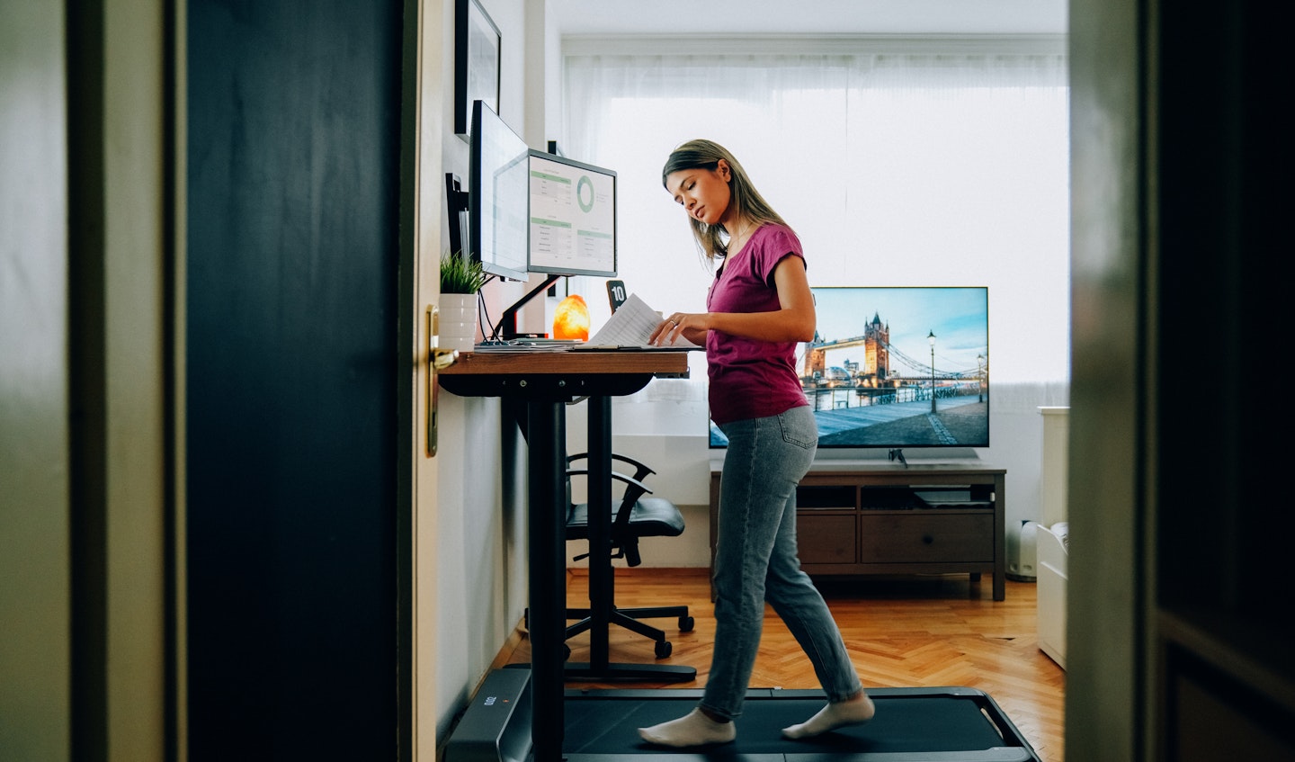 woman on treadmill desk